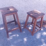 Two vintage wooden stools