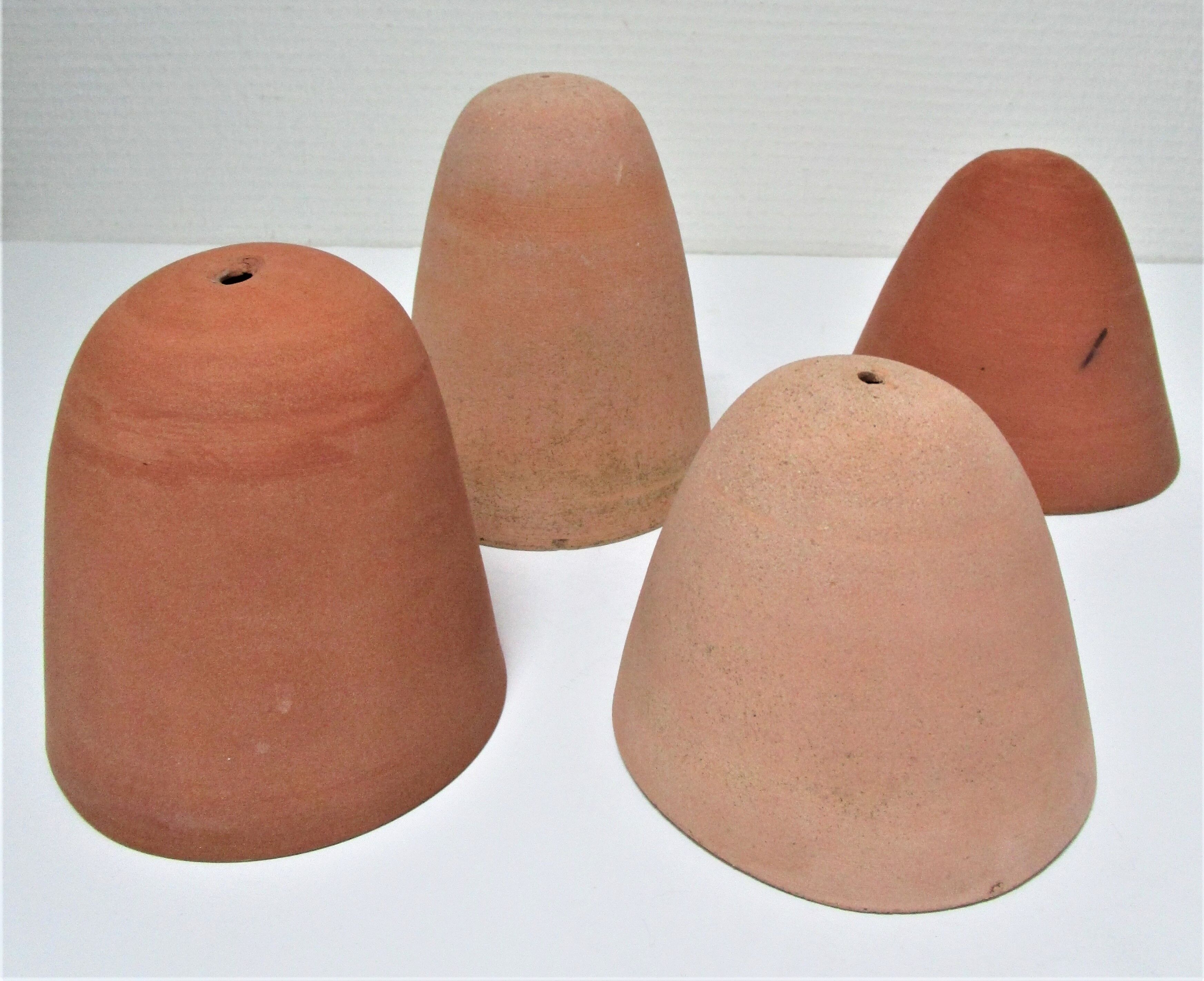 Four bells for seedlings in vintage terracotta