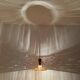 Lampe murale en teck et raffia ajustable