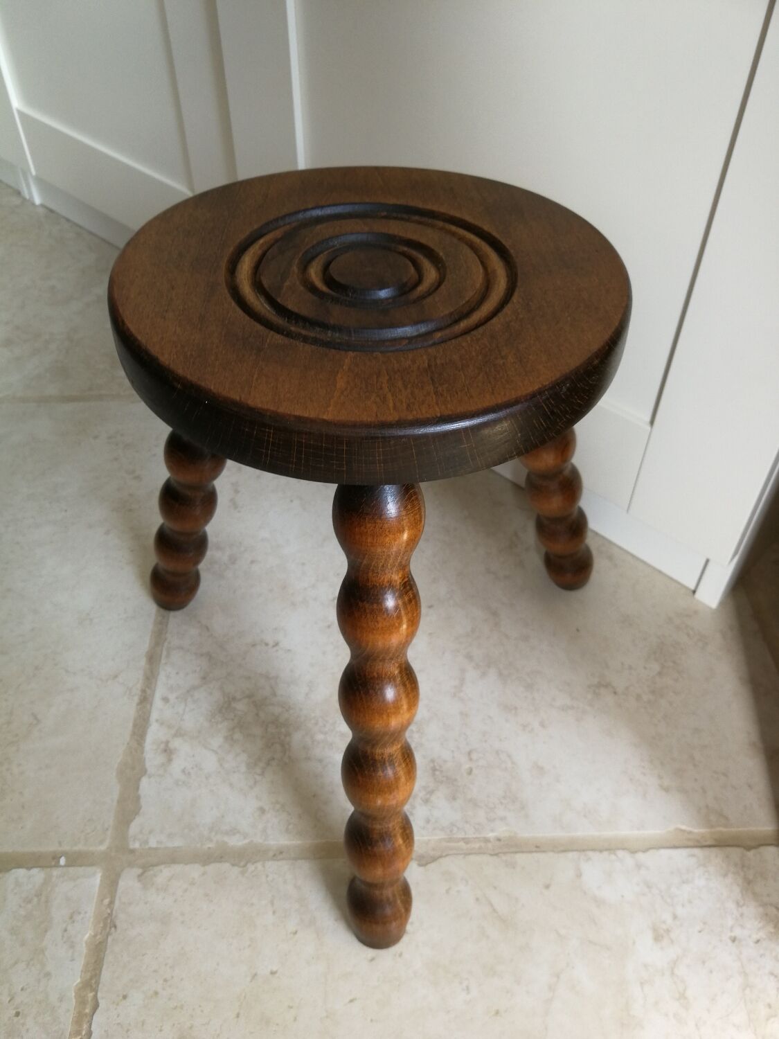 Vintage wooden tripod stool
