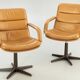 Pair of swivel armchairs by Geoffrey Harcourt.