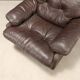 Pair of brown leather armchairs "Coronado"