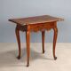 Antique writing desk in carved walnut, Italy, 19th century.