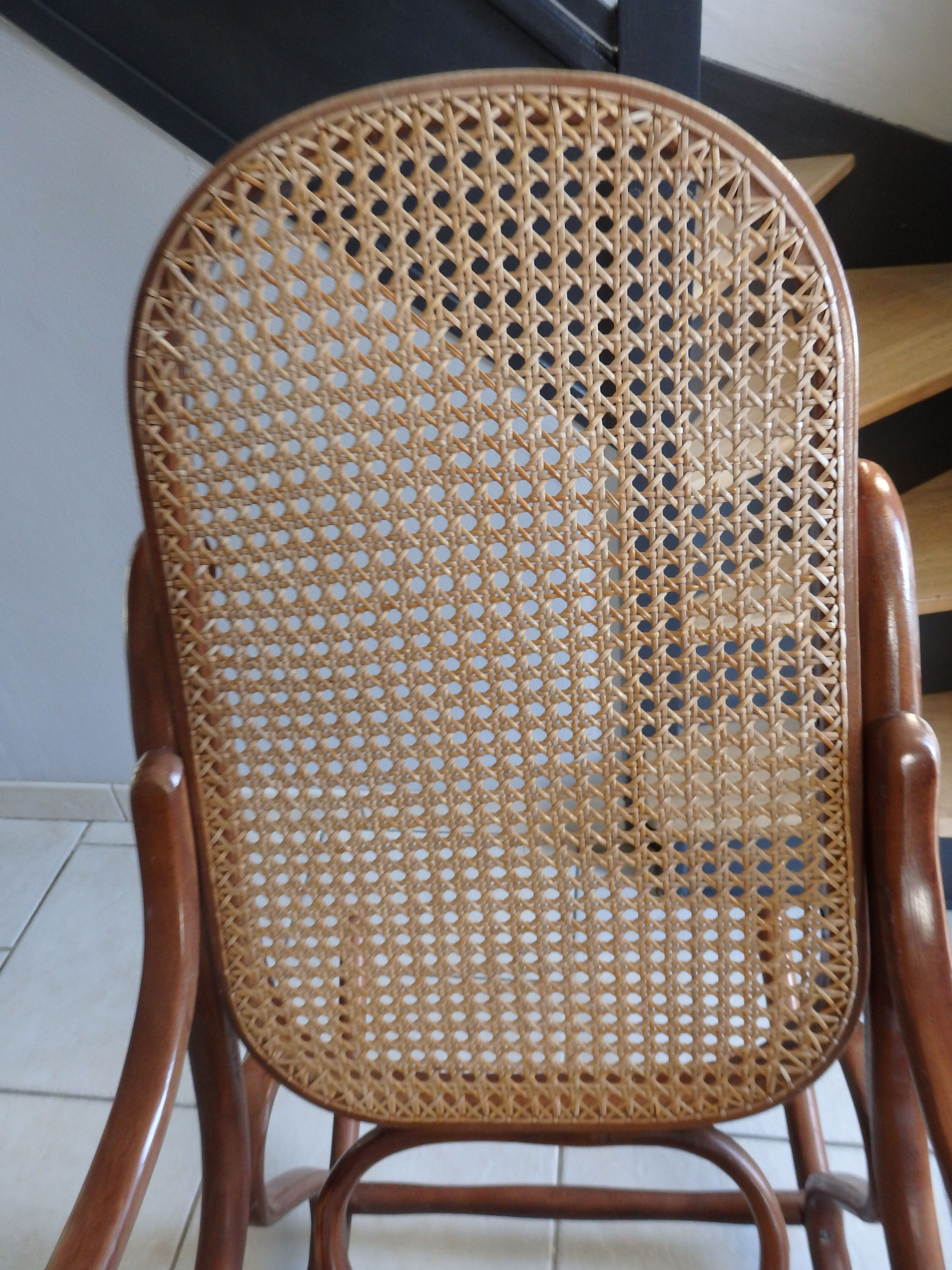 Rocking-chair in turned wood and cannage
