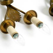 A pair of mid-century modern brass wall lamps by Vereinigte Werkstätten