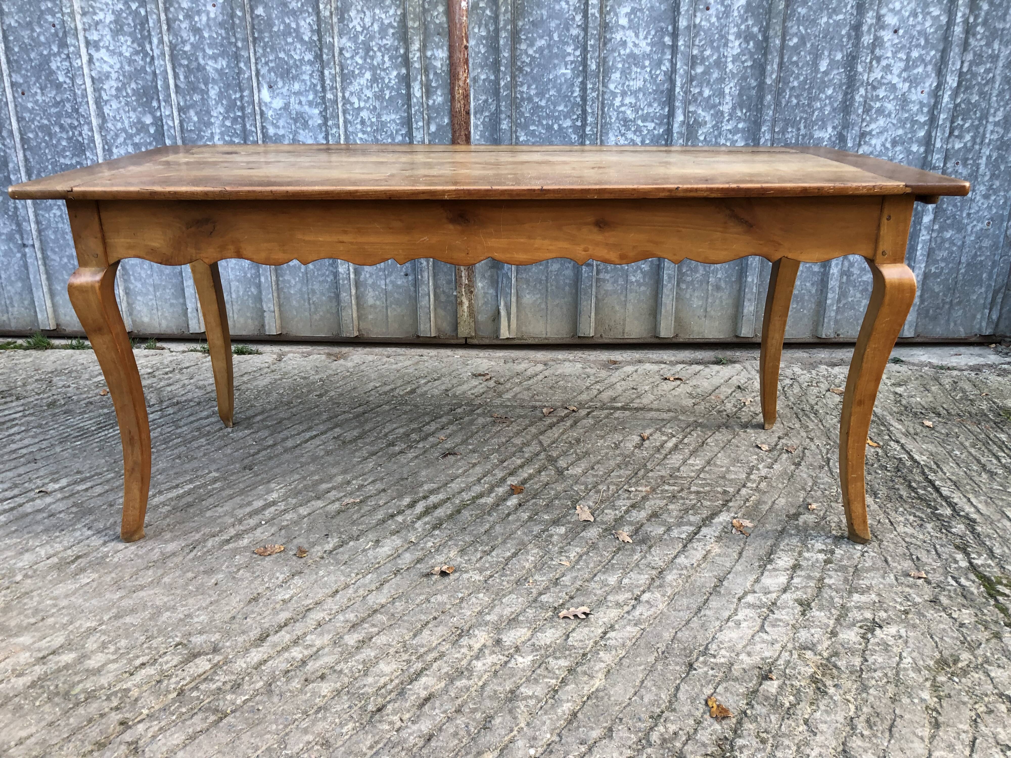Antique Louis XV style farmhouse table in solid cherry wood.