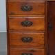 Small Victorian desk in solid walnut with drawers.