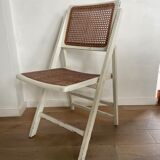 4 folding chairs with wicker seating
