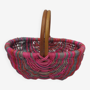 Small multi-colored wicker basket for children