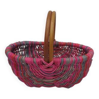 Small multi-colored wicker basket for children