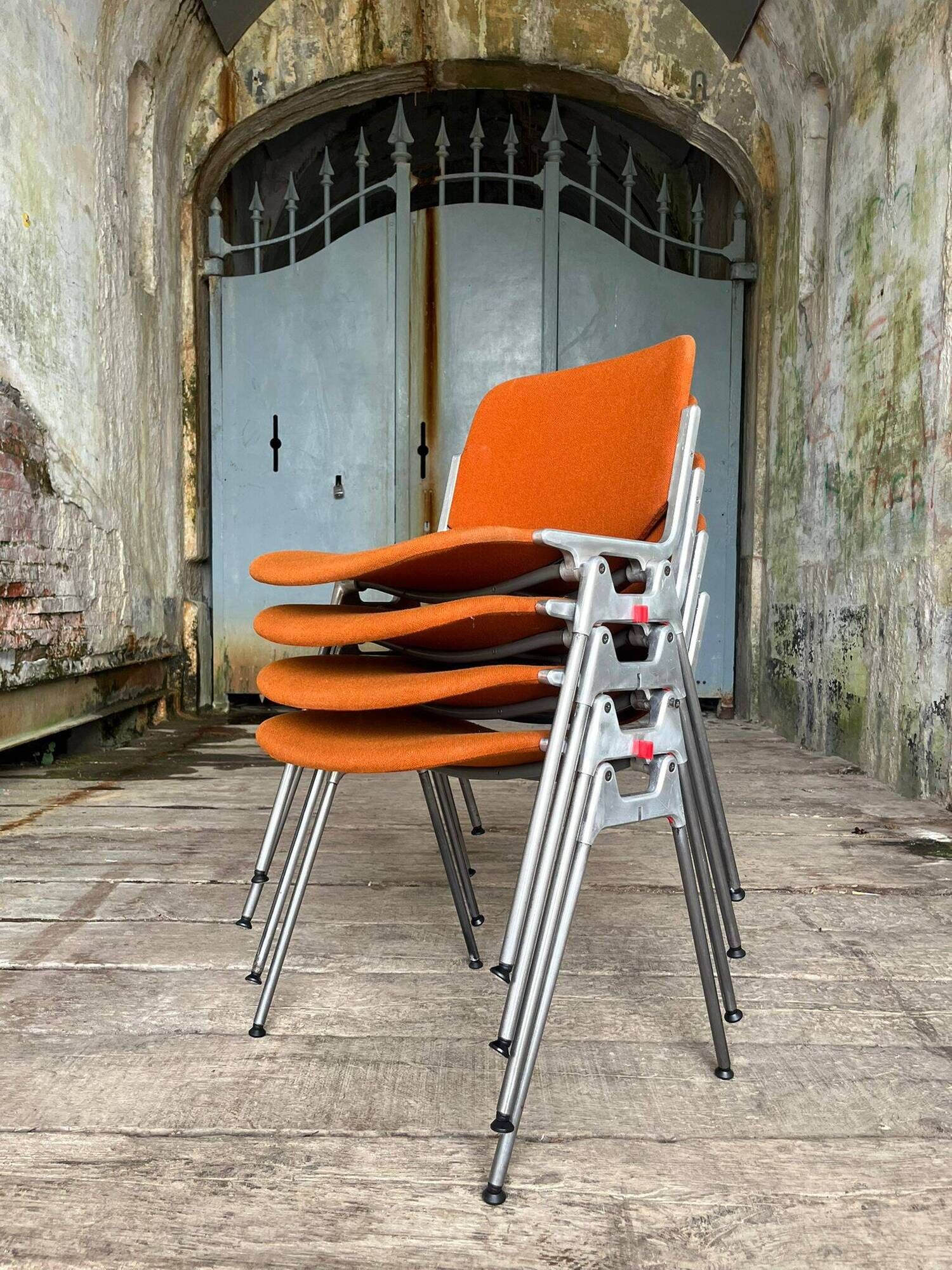 DSC 106 chair in orange by Giancarlo Piretti for Castelli, 1970s.