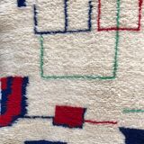 Beni Ouarain Berber carpet with blue, red and green coloured patterns 3.02x2.05m