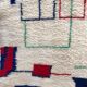 Beni Ouarain Berber carpet with blue, red and green coloured patterns 3.02x2.05m