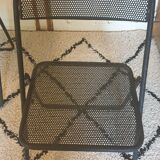 Pair of folding chairs in perforated metal