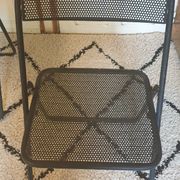 Pair of folding chairs in perforated metal