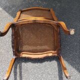 Fauteuil canné sculpté style Régence