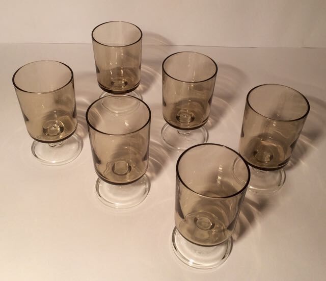 Series of glasses with smoked glass feet