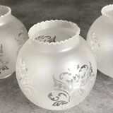 Set of 3 globes with matte glass lampshades and engraved decoration