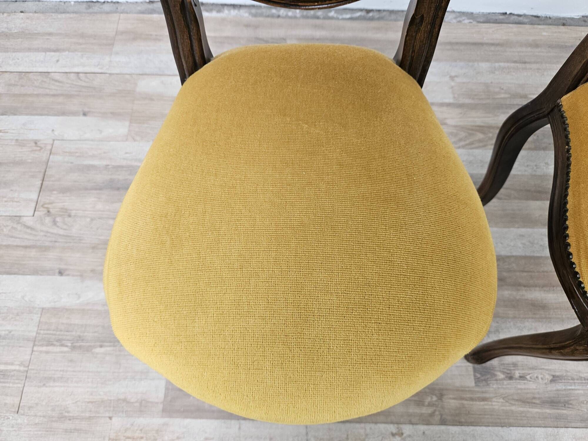 Pair of early 1900s wooden chairs with padded seat and backrests