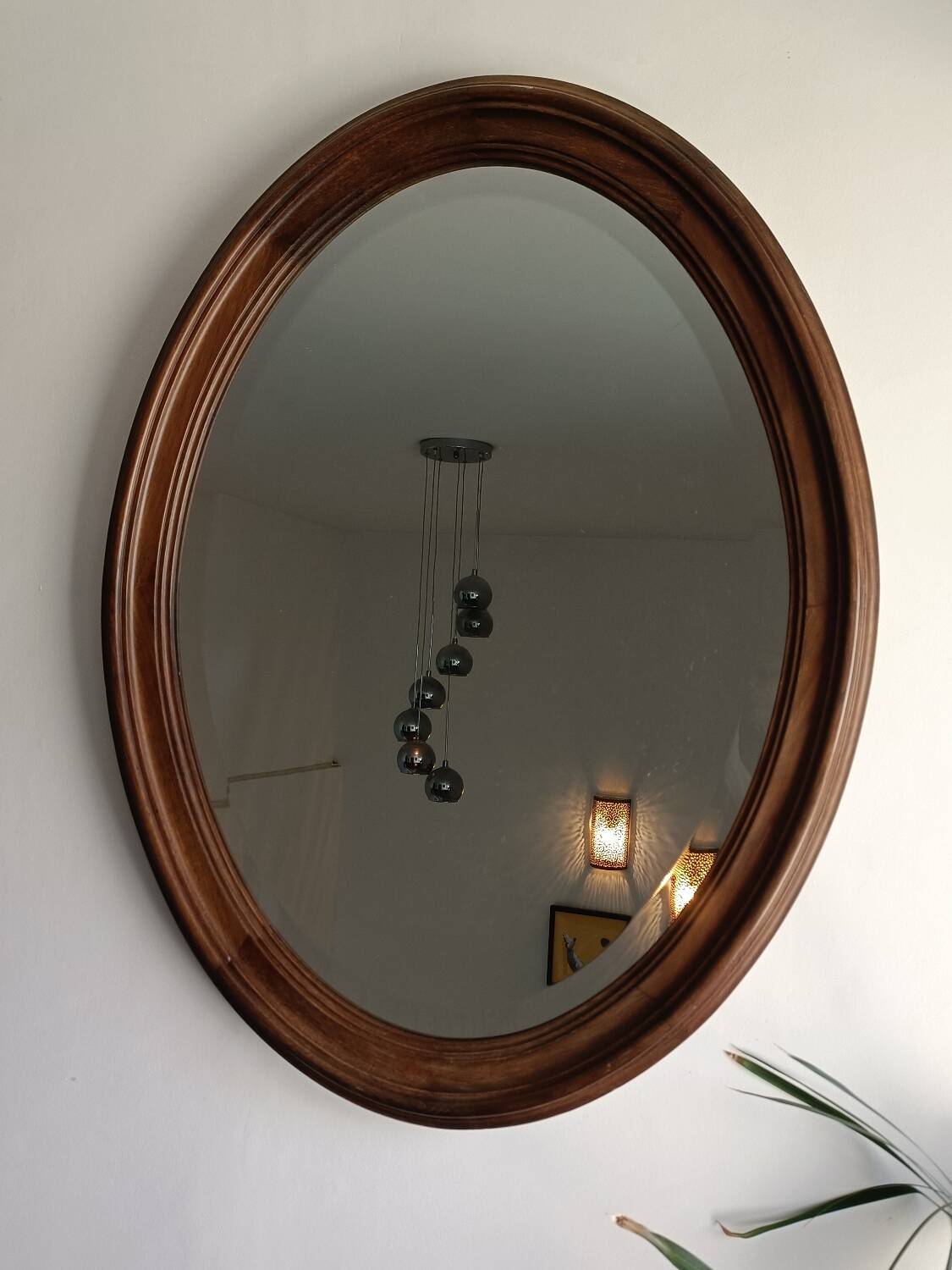 Antique oval beveled mirror