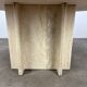 Round travertine coffee table
