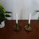 Pair of vintage brass pusher candle holders