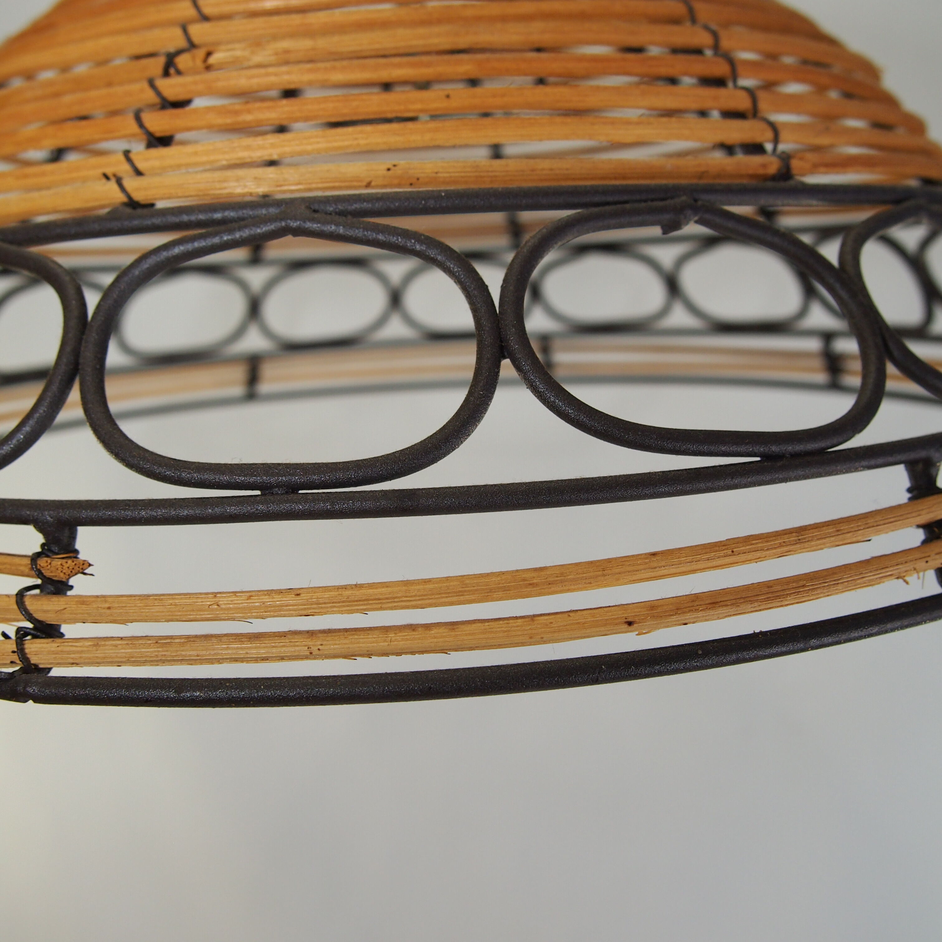 Rattan and wrought iron hanging lamp