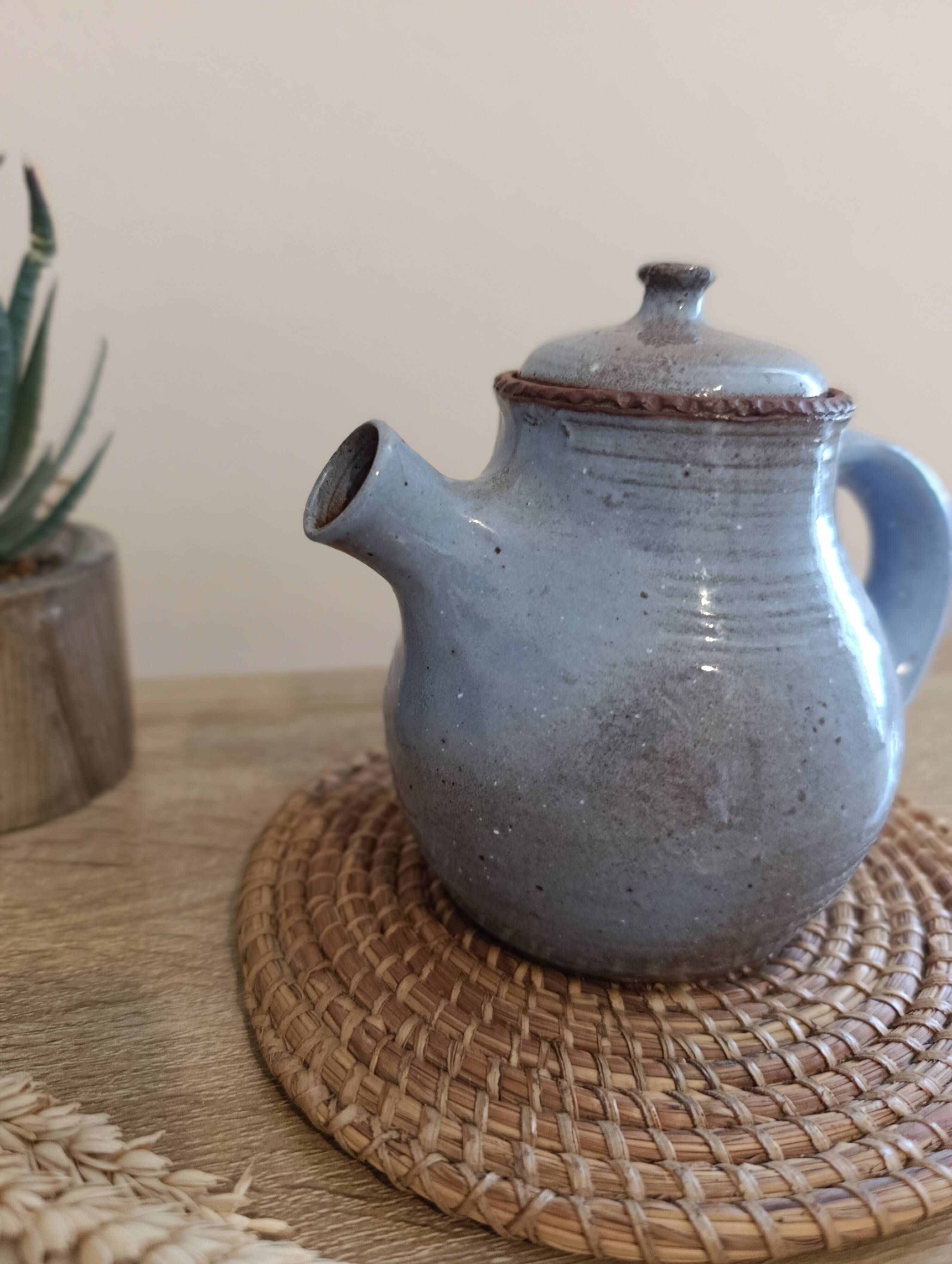 Ceramic teapot in blue/grey glaze, signed by Jeanne and Norbert Pierlot.