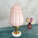 Art Deco lamp with pastel pink opaline globe.
