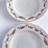 Pair of soup plates by EPIAG | ribbons/bows and garlands