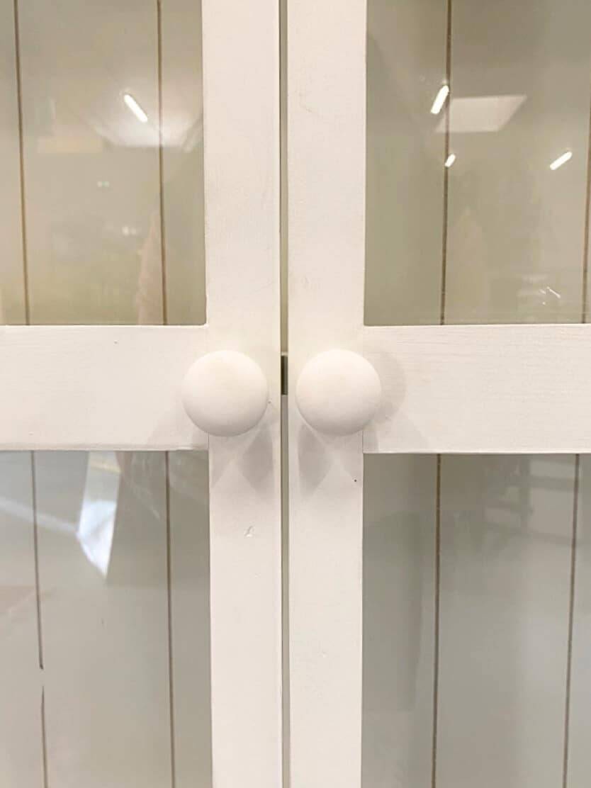 White wall display cabinet