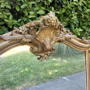 Old Louis XV style mirror in wood and gilded stucco. Napoleon III