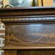 Mahogany showcase with marquetry