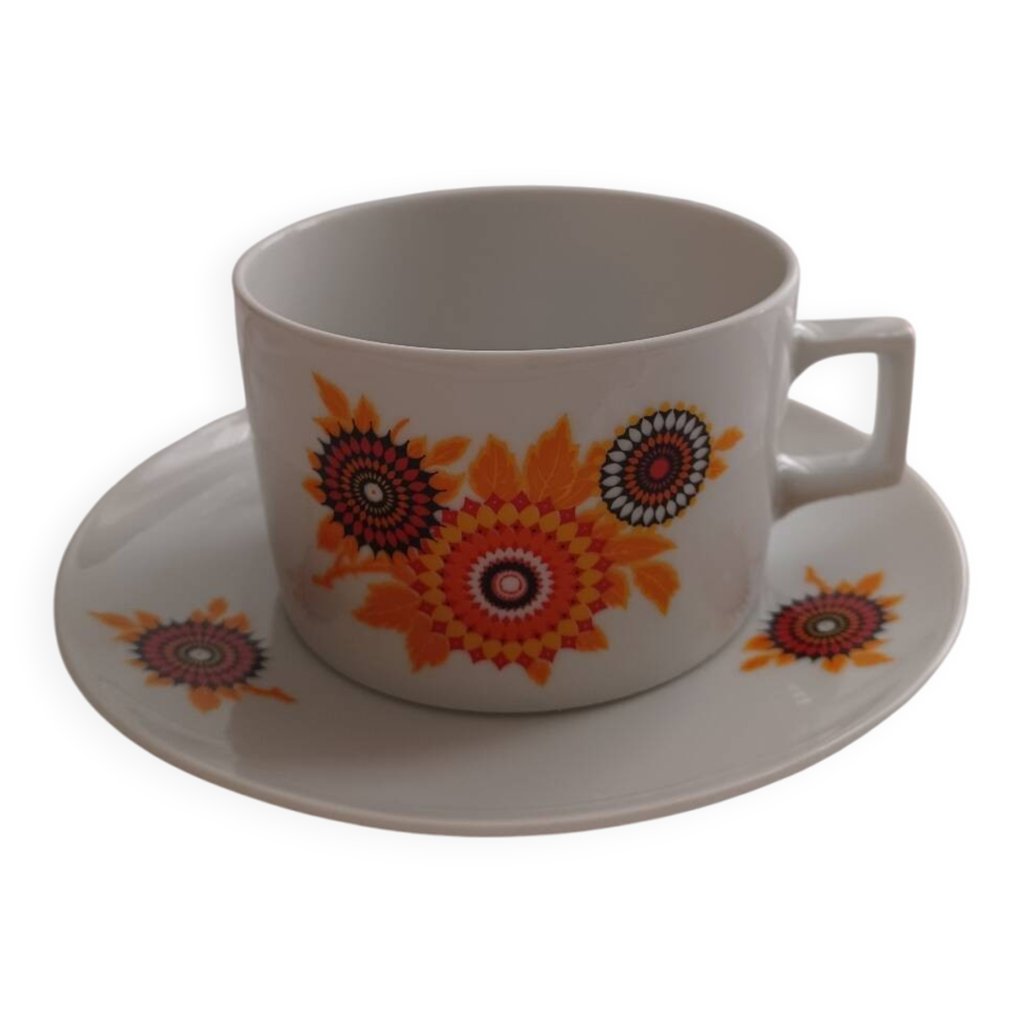 Vintage orange patterned cup and saucer