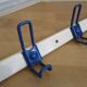 White and blue lacquered steel wall coat holder