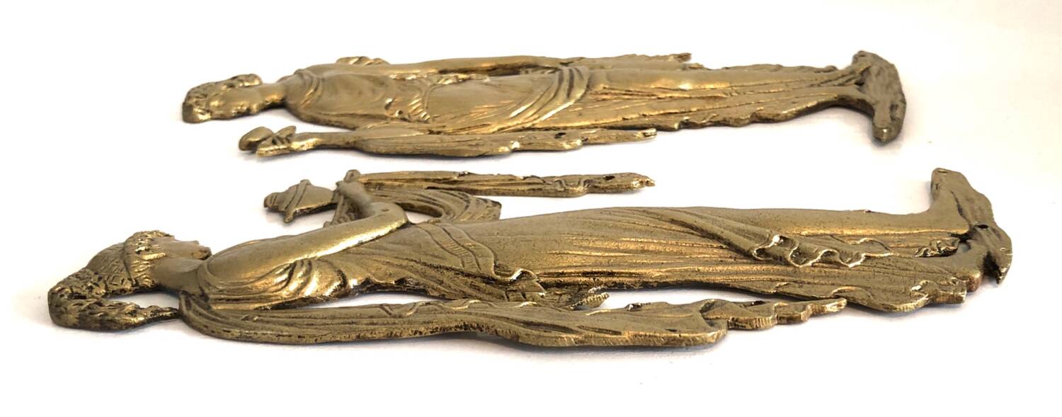Pair of gilded bronze bas-reliefs of women