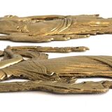 Pair of gilded bronze bas-reliefs of women