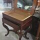 Dresser or vanity table from the Charles X / Empire period in mottled mahogany.