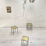 Suite of metal and glass nesting tables.