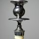 Pair of vintage candlestick holders in silver-plated metal with ivory-style plastic.