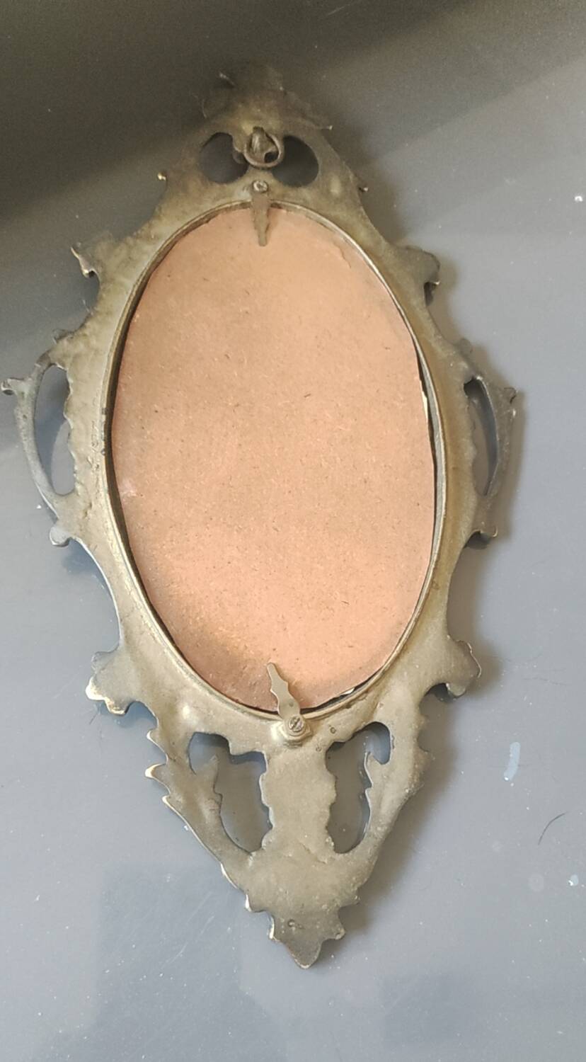Antique gilded bronze wall mirror. Rococo/Baroque style. Dimensions 31x17cm.