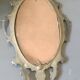Antique gilded bronze wall mirror. Rococo/Baroque style. Dimensions 31x17cm.
