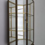 Vintage showcase in brass, glass and mirrors