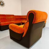 Modular vintage orange corner sofa, 1970s pop design.