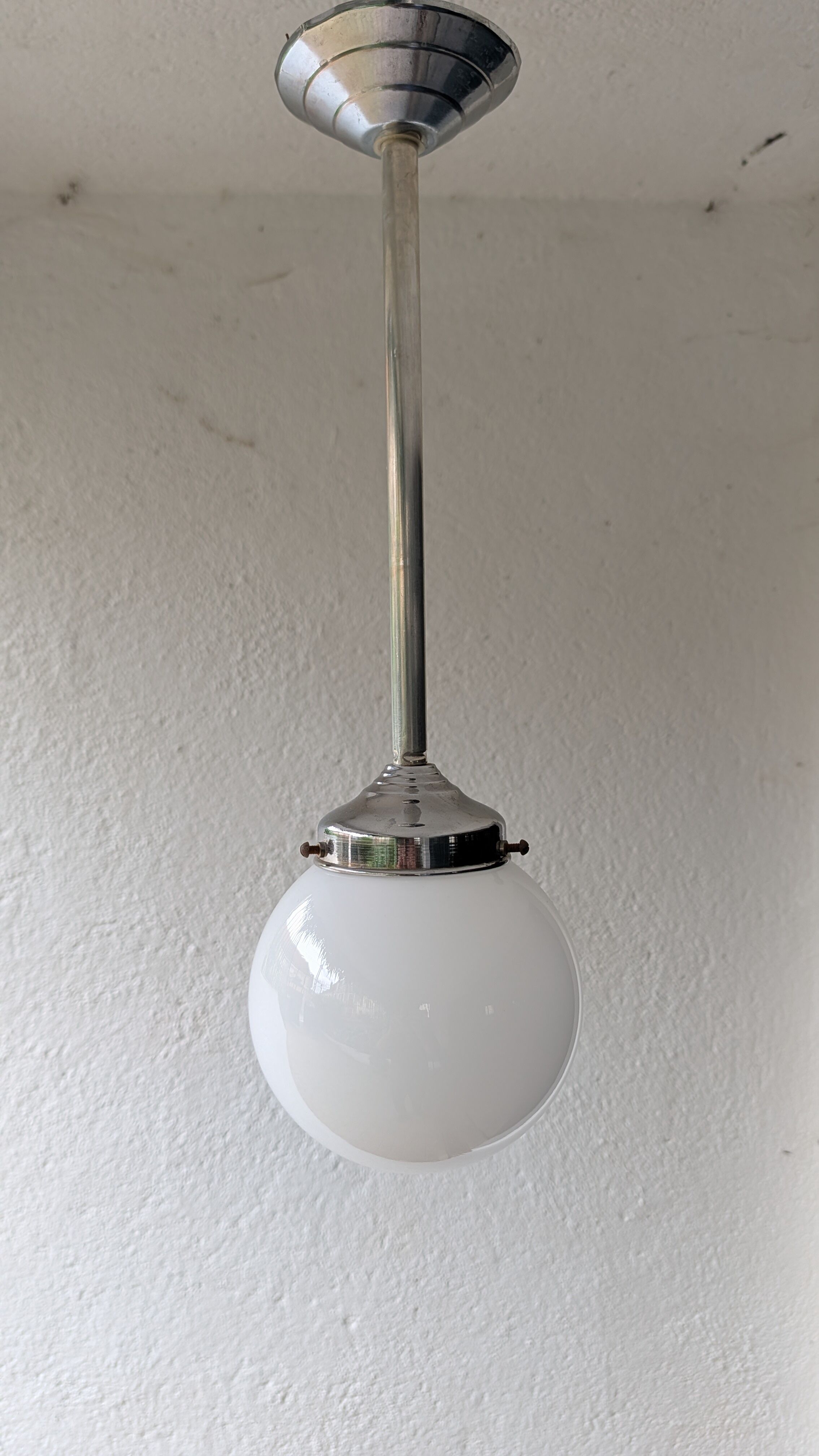 White opaline suspension and chrome metal — old school spirit