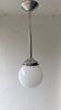 White opaline suspension and chrome metal — old school spirit