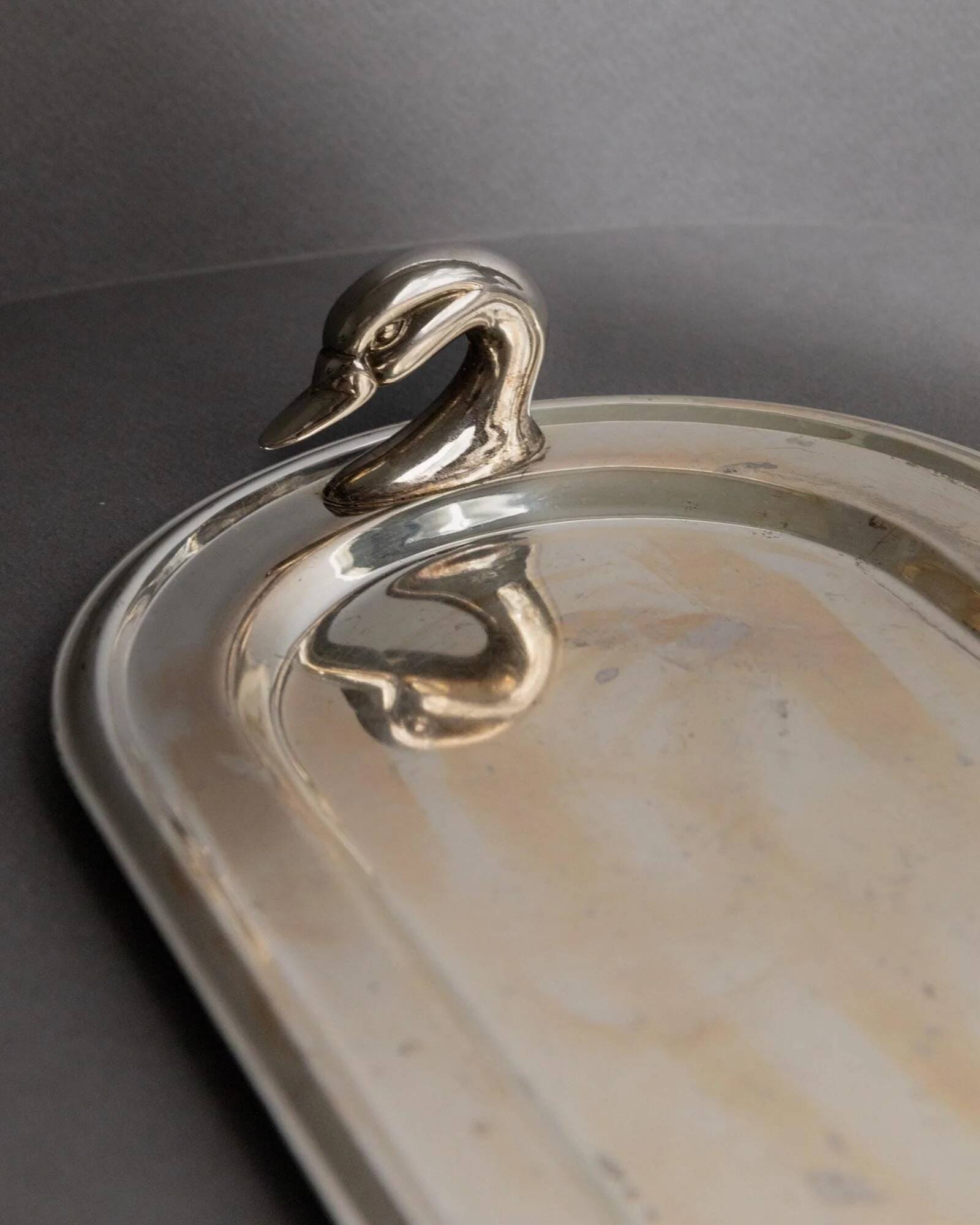 1960s vintage silver-plated oval tray with swan head handles.