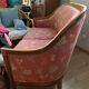 Art Deco style sofa, covered in Indian fabric with a pink background