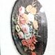 Vintage floral print with oval mat and gold wooden frame.