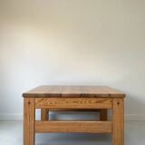 Two vintage Swedish sofas and a pine table